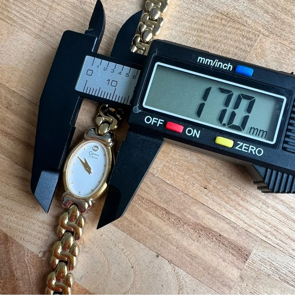 Caravelle by Bulova ladies oval gold tone dress watch NEW BATTERY